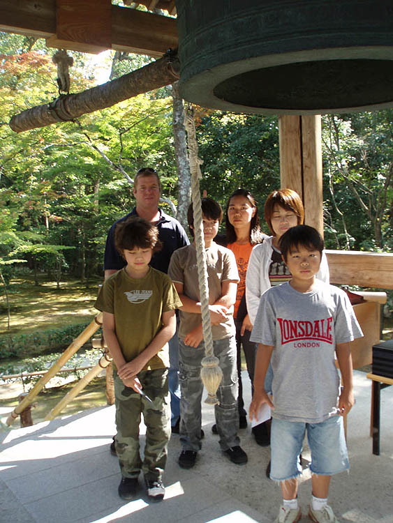 The family at a ceremony for Kana's father