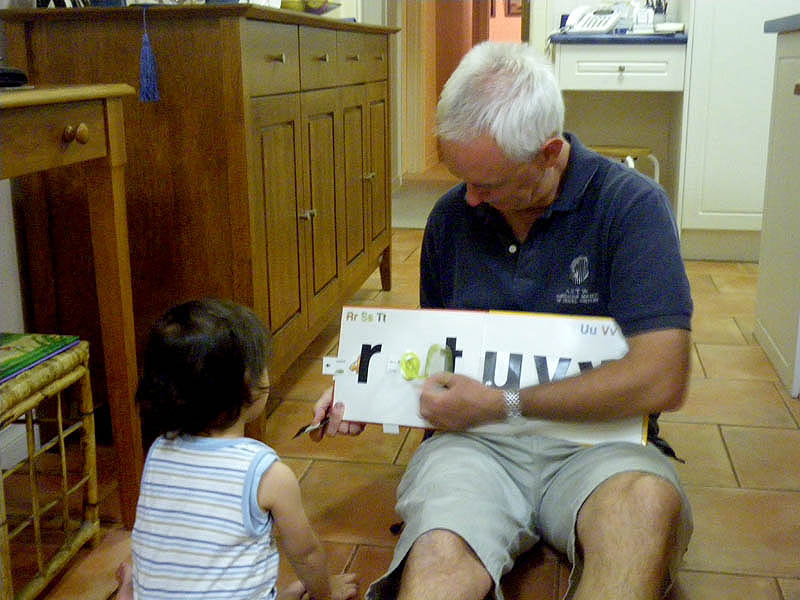 Philip reads to Ace, April, 2010