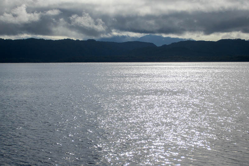 Sunlight on Macquarie Harbour as we travel towards Hells Gates