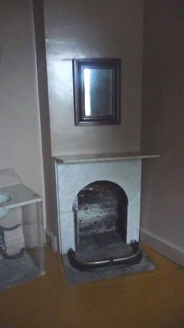 Fireplace in the bathroom to keep warm during the colder months of the year.
