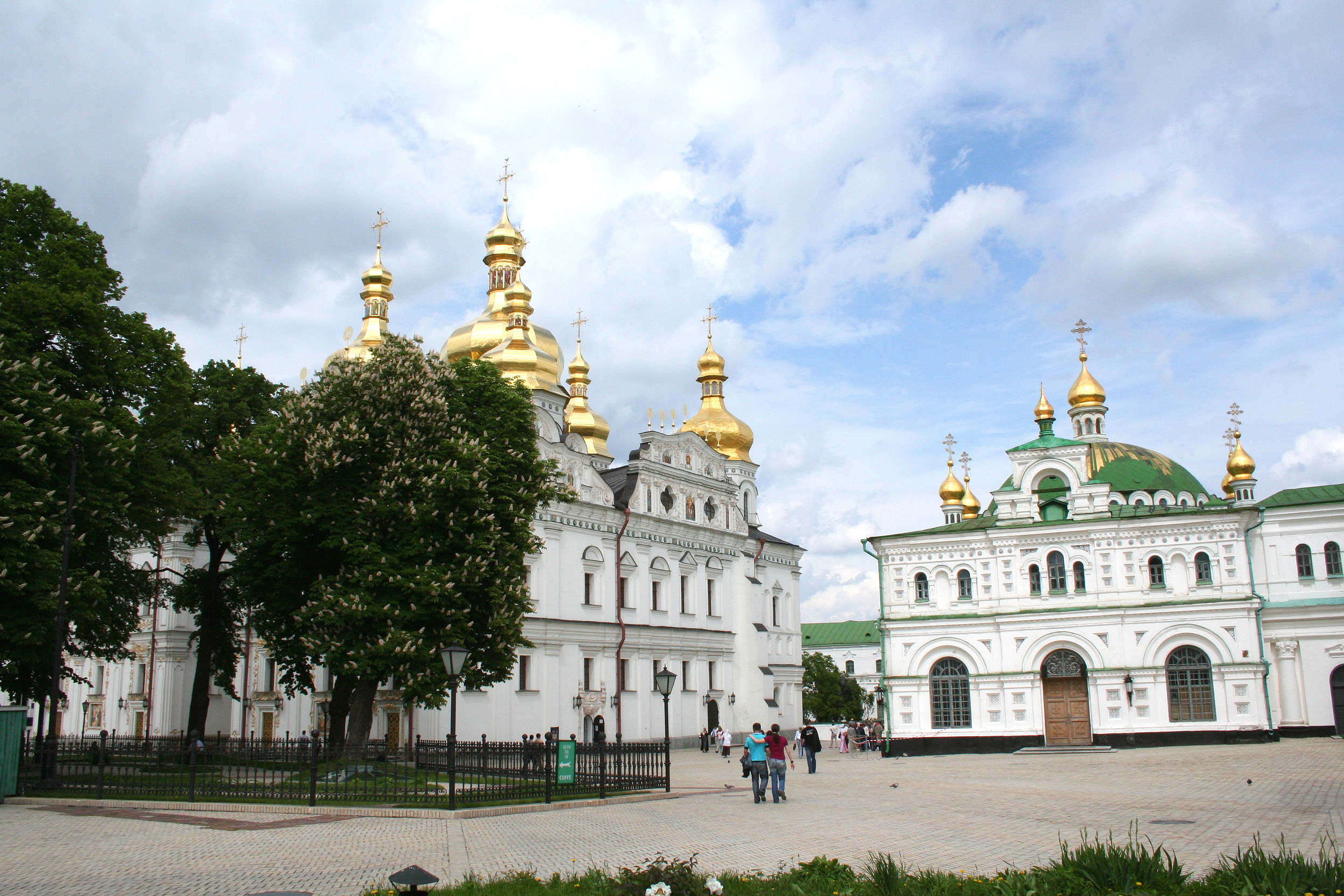 View of the Dormition Cathedral and another building to its right.