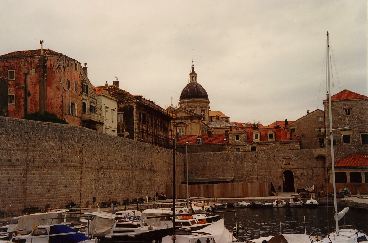 Another view of the Old Port with Dubrovniks fortified walls and Cathedral of the Assumption in the background.