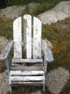 Old chair by the sea