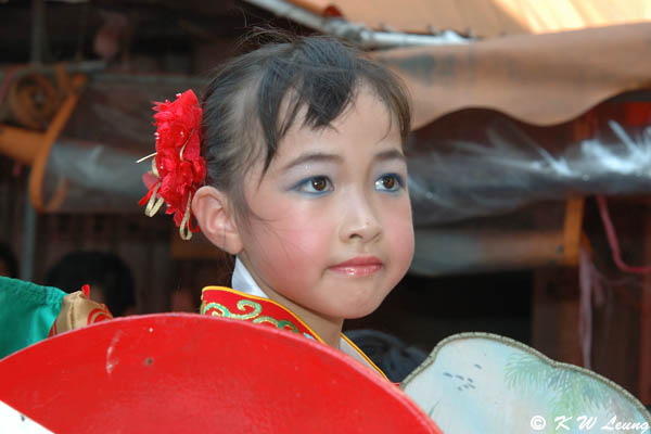 A little girl in float procession 01