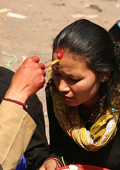 Getting a blessing at Dakshinkali temple, Nepal.