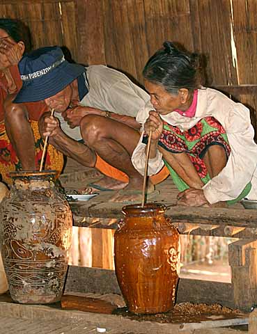 Jars of rice wine, Kameng, Cambodia.