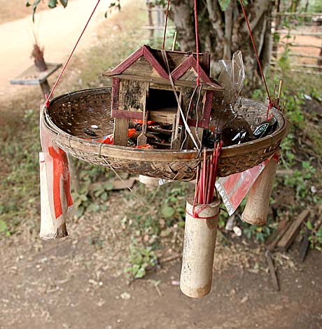 Offering of sweets for the young, or little spirit. Phnong village Sr Ampum, Mondulkiri, Cambodia