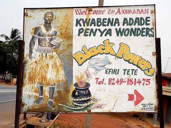 Priest Kwabena Adade Penya from Akomadan offers his services on a billboard.