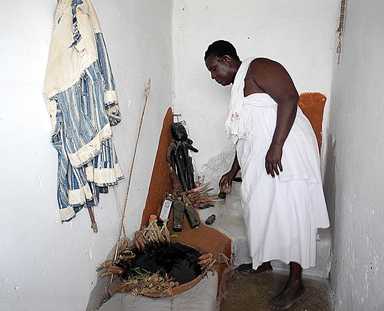 The fetish priestess Nana Saah from Kubease in her shrine with her fetish Asuo Densu.