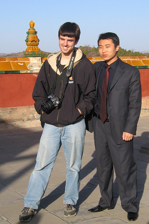 Random guy wanting to take his picture with the foreigner.