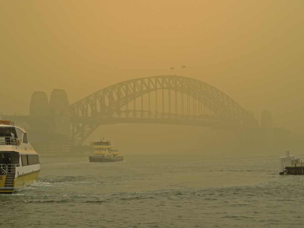 SYDNEY HARBOUR BRIDGE LOOMING OUT OF THE DUST