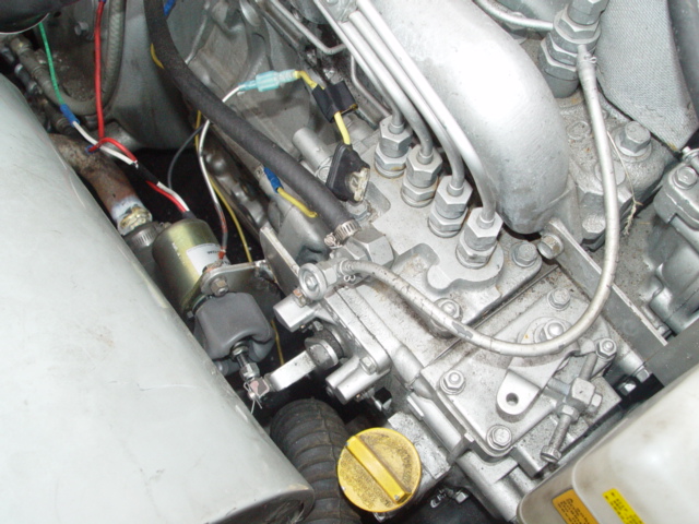 THE FUEL SHUTOFF SOLENOID HAD TO BE MODIFIED SOME TO FIT