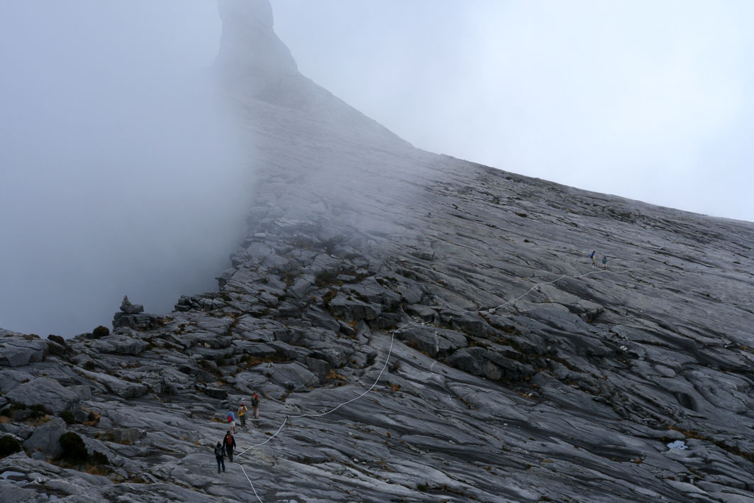Climbing Mount Kinabalu - clouds moving in