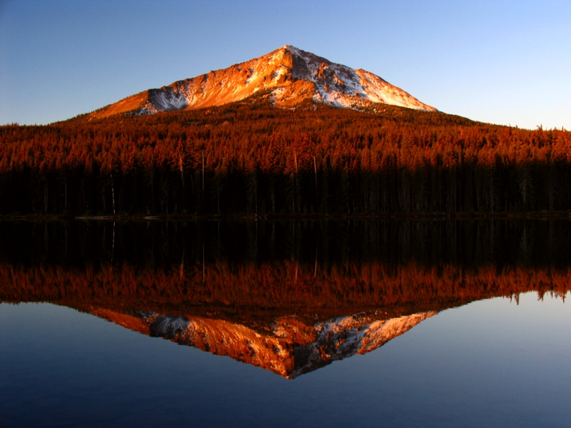 Sunrise on Mt McLoughlin across Squaw lake