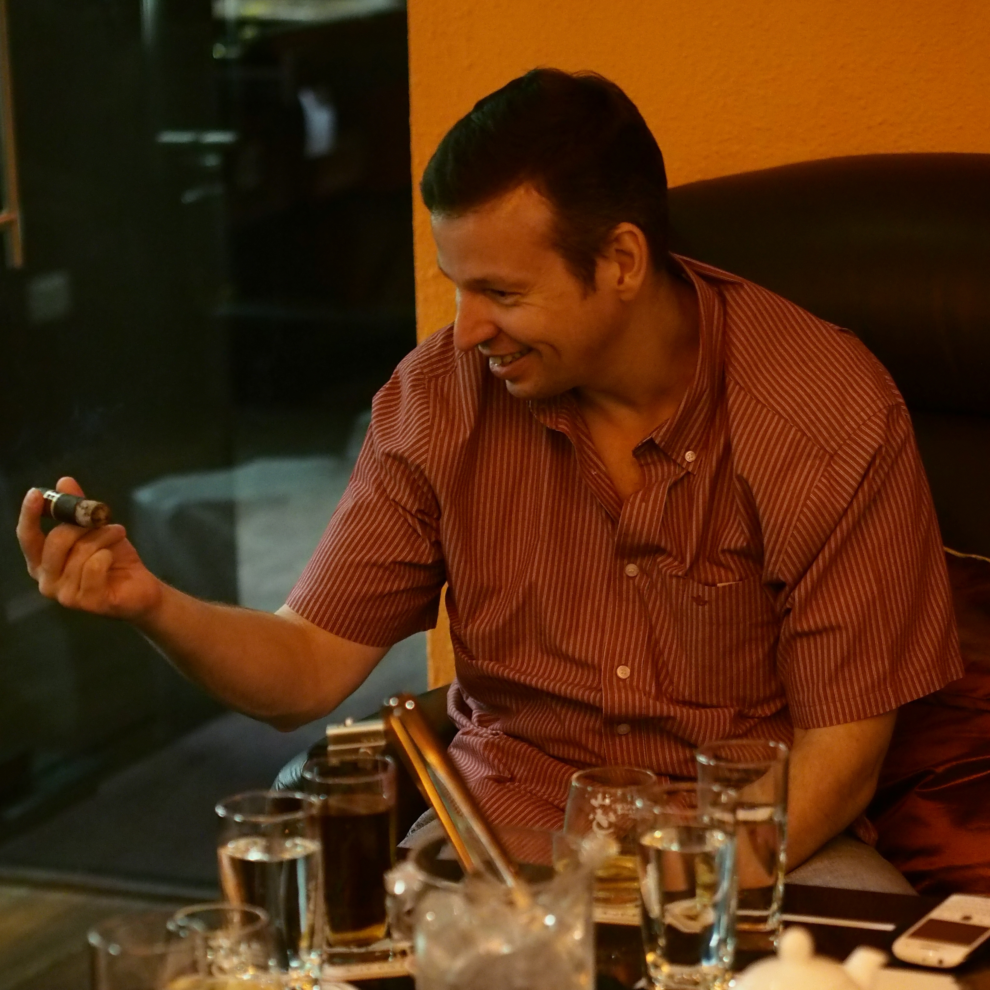 Man from Malaysia appreciating a Nub Maduro