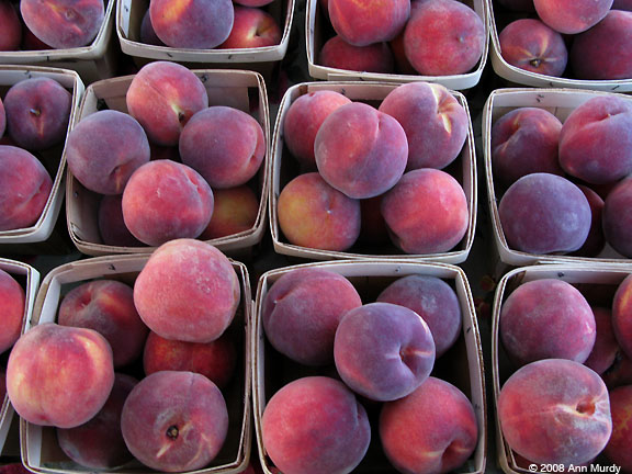 Boxes of peaches