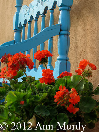 Geraniums and Blue Bench