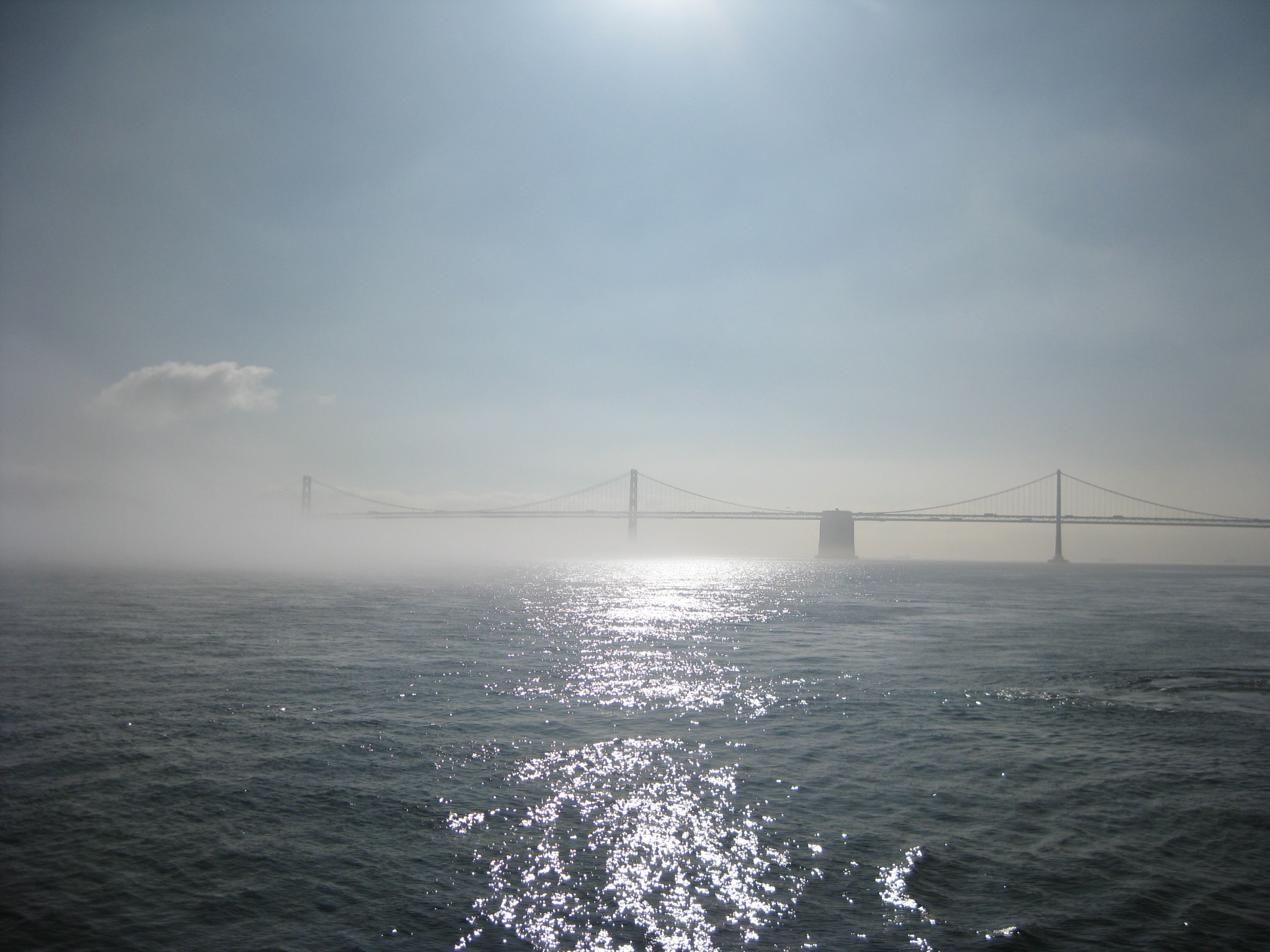 Golden Gate bridge shrouded in morning fog