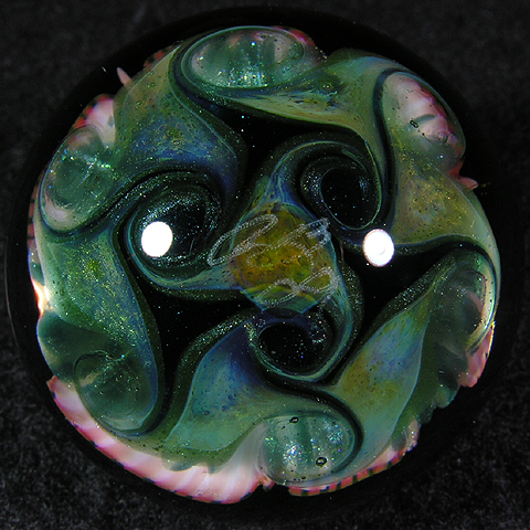 A B implodes out of this stunning flower, made with 11 different Northstar colors and fumed 22kt gold.