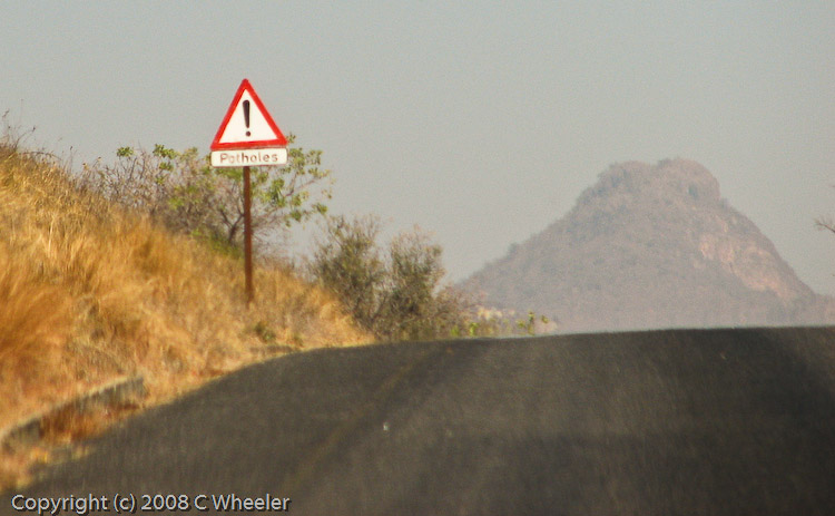 Why dont they fix the potholes instead of putting up signs?