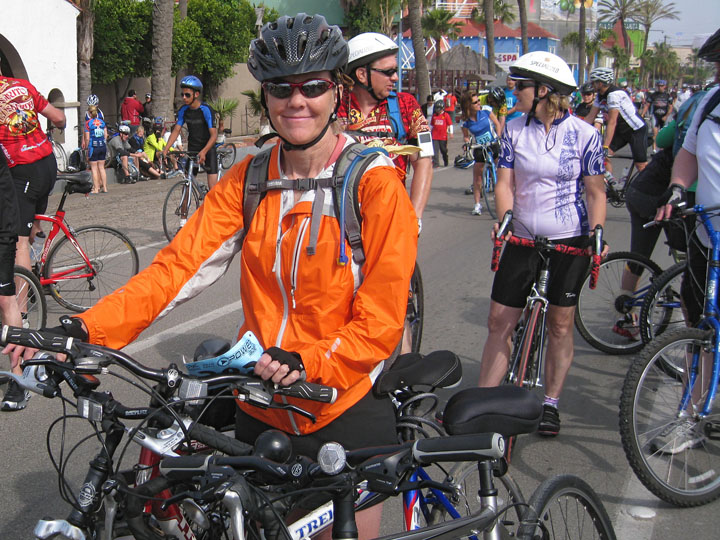 Carri in her screaming orange fluorescent road wear