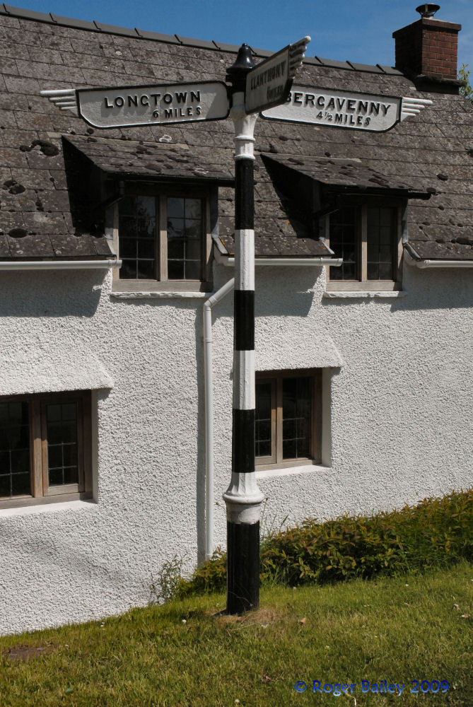 Finger post sign.