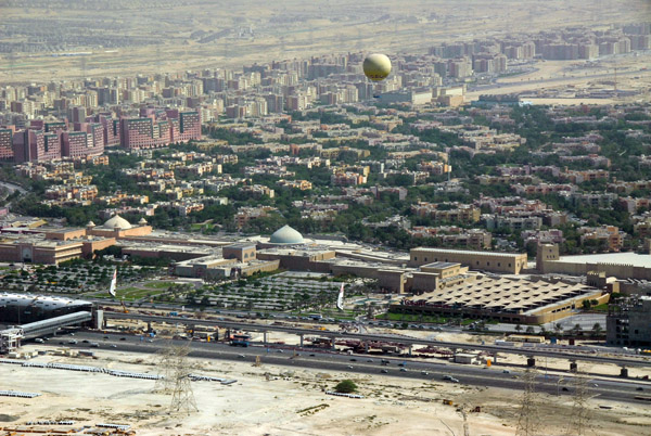 Observation balloon flying over Ibn Battuta Mall with The Gardens in the background