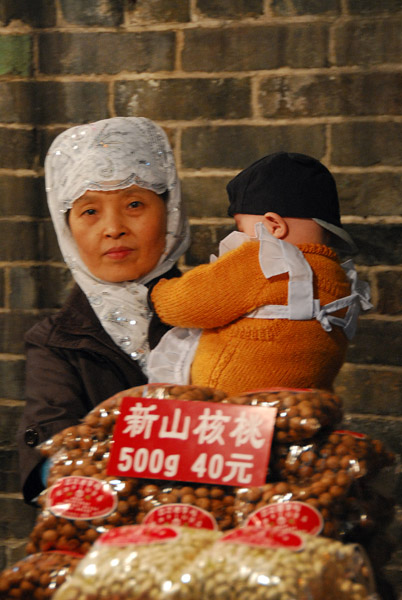 Chinese Muslim woman with child, Xi'an
