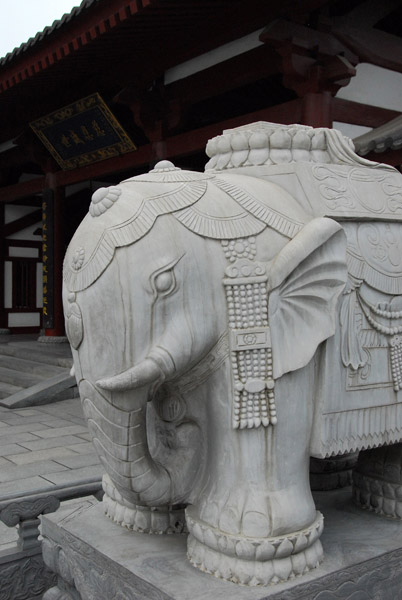 Carved elephant in the courtyard in front of Komyodo Hall