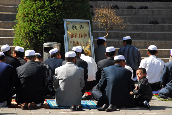 Midday prayers on Eid al Fitr, Dongguan Mosque, Xining
