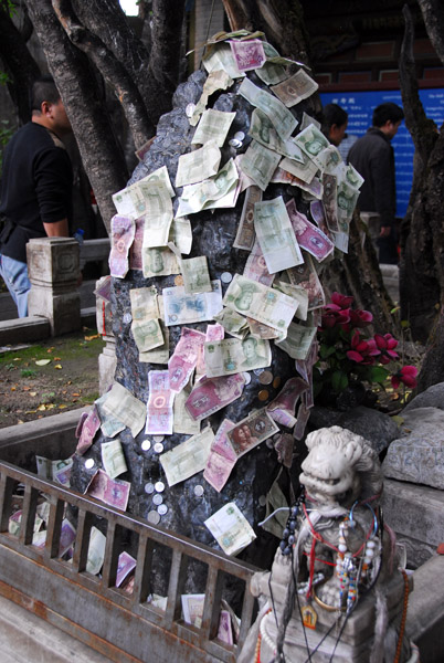 Offerings of casy on a sacred stone