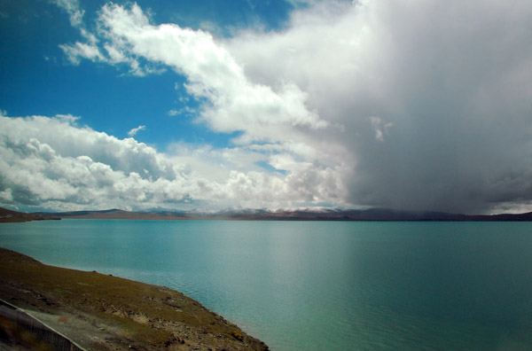 Dark cloud building beyond Cuonaho Lake, Tibet