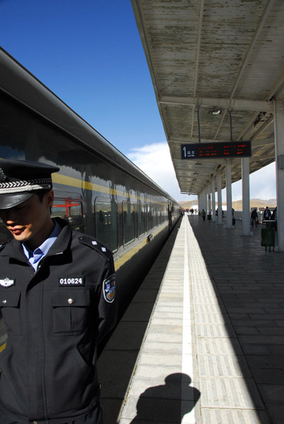 Chinese officer on the platform of Na Qu Station