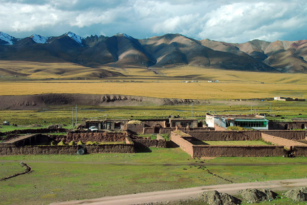 Each traditional Tibetan house in this area has its own enclosure