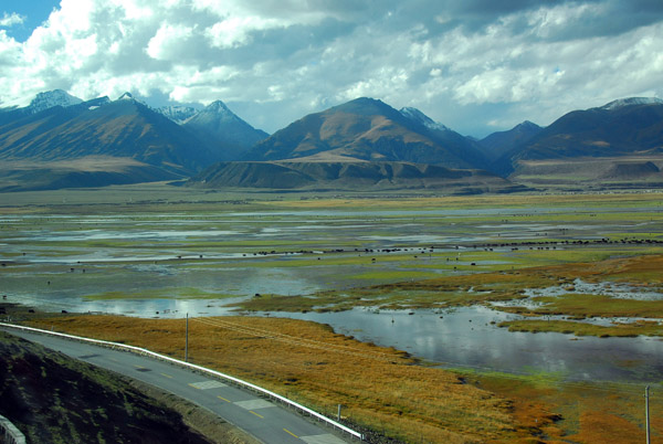 Wetlands outside Dangxiong with the Nyainqentanglha Range, Tibet