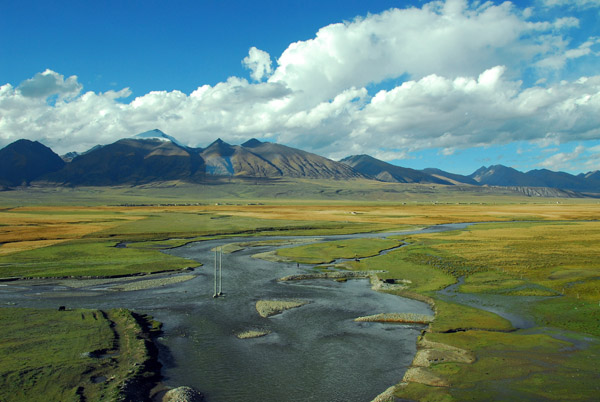 Tributary of the Lhasa River south of Dangxiong, Tibet, with the Nyainqentanglha Range