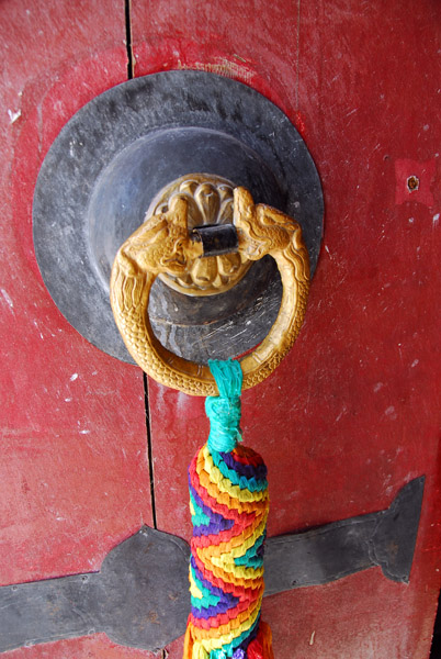 Door handle on the tourist entrance