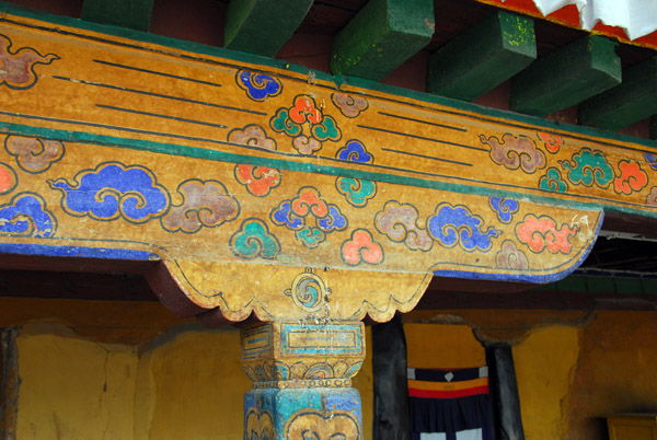 Painted beams around the Eastern Patio