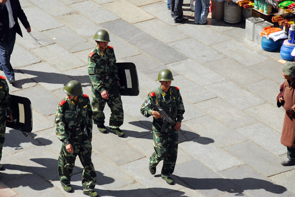 Chinese soldiers with riot shields patrolling the Barkhor, Lhasa