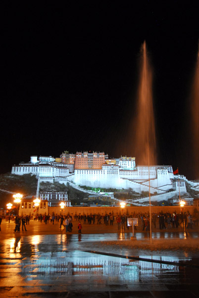 Potola Palace with the Potola Square fountain at night, Lhasa