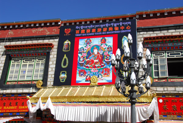 Shop on the Barkhor Circuit displaying a large Thangka