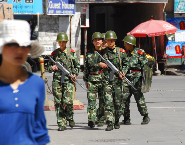 Armed Chinese soldiers are a common sight in Lhasa