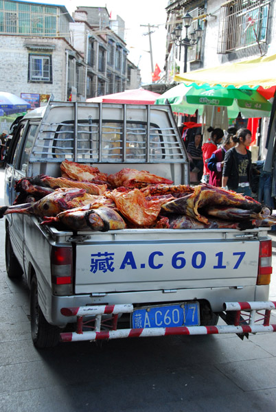 Pickup truck full of freshly slaughtered meat