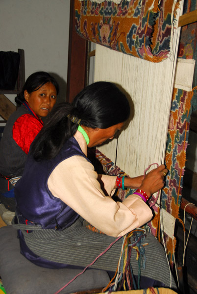 Tibetan women weaving carpets, near Nechung Monastery