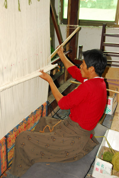 Carpet weavers are both men and women