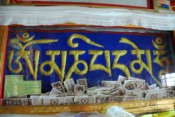 Famous carved mantra Om Mani Padme Hum of Rigsum Gonpo Temple, Pabonka Monastery