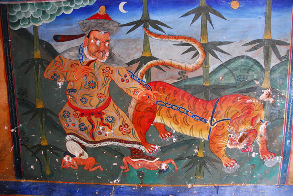 Wall mural Mongol leading the tiger representing supremacy of the Gelugpa sect over their rival red hat sect