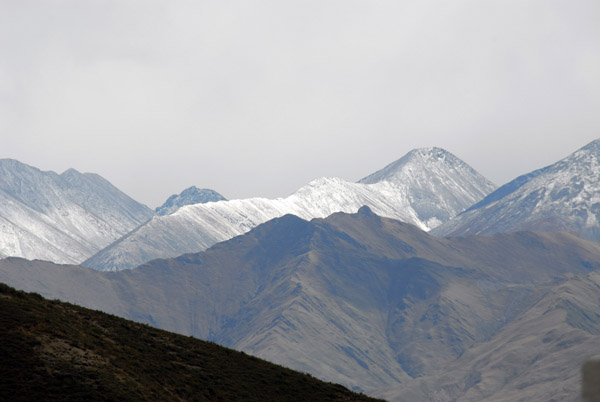 Fresh October snow on the mountains above Lhasa