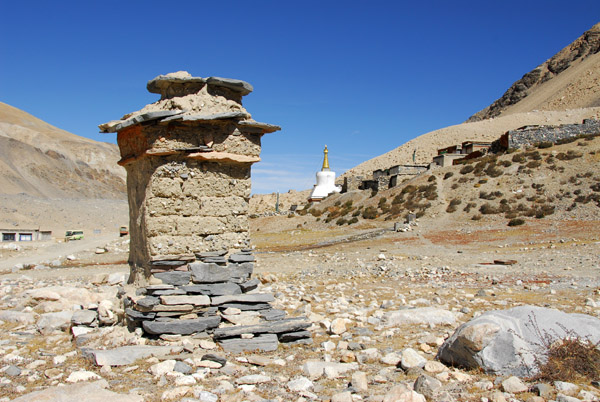 Weather-beaten old marker near Rongphu Monastery