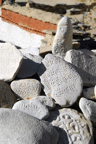 Stones carved with Tibetan inscriptions